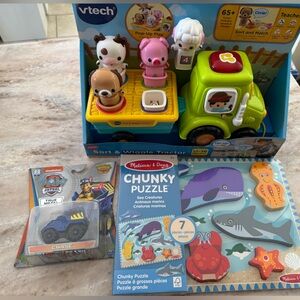 Sort & Wiggle Tractor, Melissa & Doug puzzle and Paw Patrol Chase car